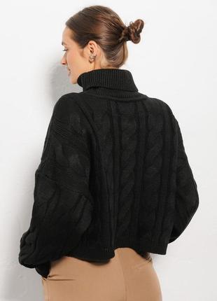 В'язаний жіночий светр чорний із великими косами3 фото