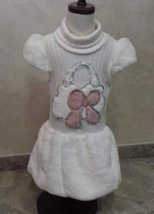 Тепленькая тунику.