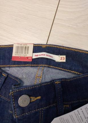 Джинсы женские levi's 710 23/324 фото