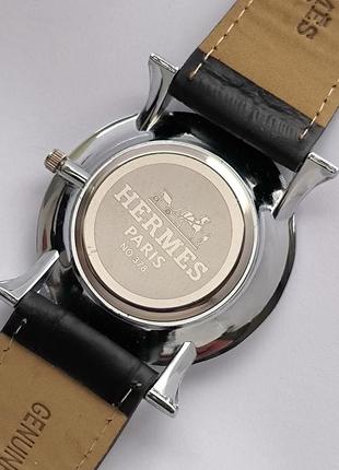Женские наручные часы серебристого цвета с белым циферблатом, черный ремешок, дата4 фото