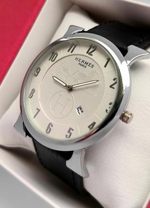Женские наручные часы серебристого цвета с белым циферблатом, черный ремешок, дата3 фото