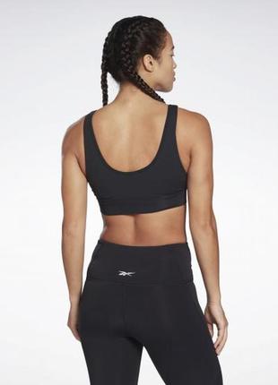 Спортивний топ бюстгальтер бра studio reebok stripped minimalist h518533 фото