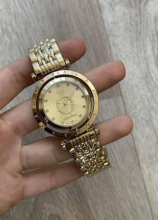 Стильные женские наручные часы золото