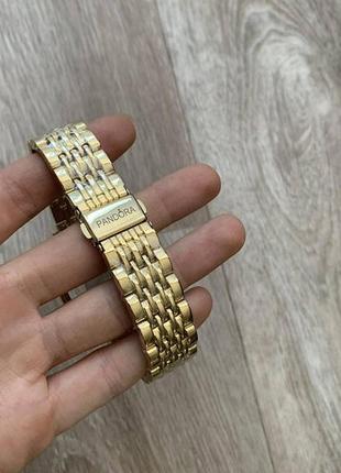 Стильные женские наручные часы золото