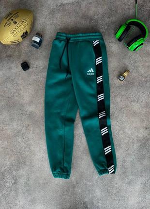 Зимняя, зеленая спортивная штана брюки брюки брюки на флисе с лампасами adidas теплые зеленые спортивные штаны на флисе adidas с ласпасами3 фото