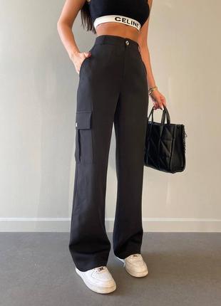 Женские трендовые брюки карго из костюмной ткани.2 фото