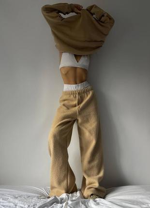 Теплі штани тедді баранчик вільного крою палаццо з високою посадкою на резинці зі шнурком широкі3 фото