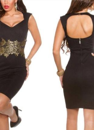 Нове чорне плаття з відкритою спиною та золотою вишивкою1 фото