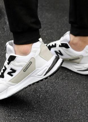 Мужские стильные кроссовки new balance біло-сірого кольору з чорним5 фото