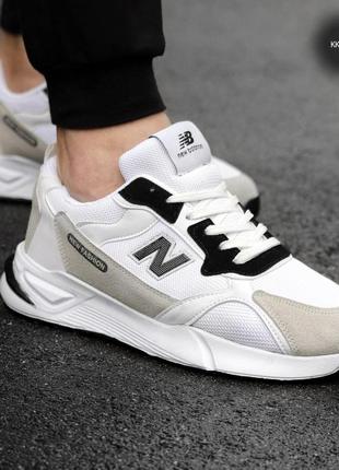 Мужские стильные кроссовки new balance біло-сірого кольору з чорним6 фото