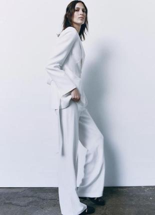 Белый костюм брюки и жакет ( пиджак)7 фото