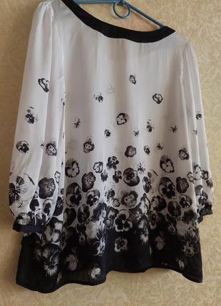 Женская блуза свободного кроя с цветочным принтом4 фото