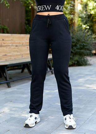 Жіночі теплі спортивні штани з начосом 50 52 54 56 58 60 чорні1 фото