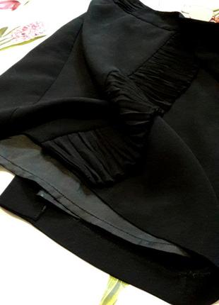 Стильная черная юбка миди  с оборкой имитацией запаха от next8 фото