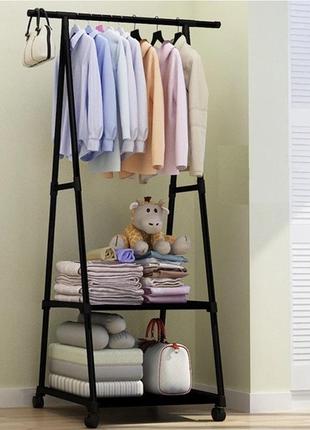 Универсальная прочная напольная передвижная вешалка для одежды coat rack traingular6 фото