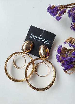 Сережки жіночі круглі підвіскою boohoo золотисті