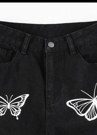 Чорні джинси з метеликами7 фото