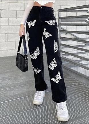 Чорні джинси з метеликами5 фото