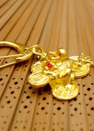 Брелок у золотому кольорі "символи фен шуй" жаба багатства
