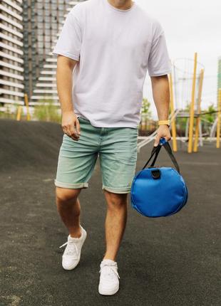 Спортивна сумка кругла тканинна синя з жовтим для спорту дорожня (bon)4 фото