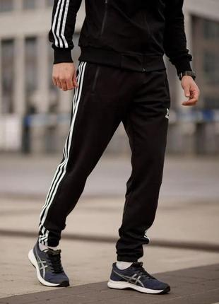 Чоловічі спортивні штани adidas чорні весняні осінні адідас на гумці бавовняні (bon)1 фото