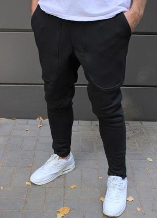 Чоловічі зимові спортивні штани чорні на флісі завужені донизу базові однотонні (bon)1 фото