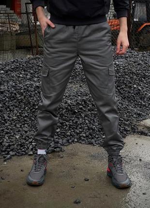 Брюки карго на флисе с карманами серые5 фото