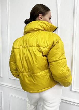 Жіноча жовта куртка
