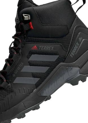 Зимові чоловічі кросівки adidas terrex swift r gore tex чорні з червоним високі до -21*с адідас терекс термо8 фото