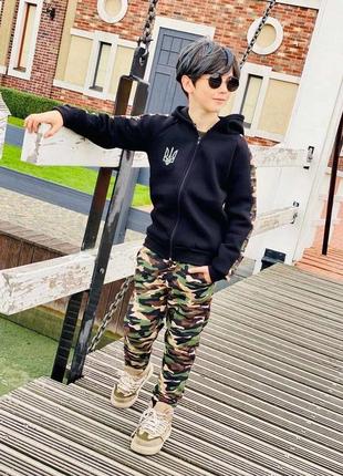 Спортивний костюм трьохнитка гарно виглядає гарно носиться не кошлатиться рекомендую