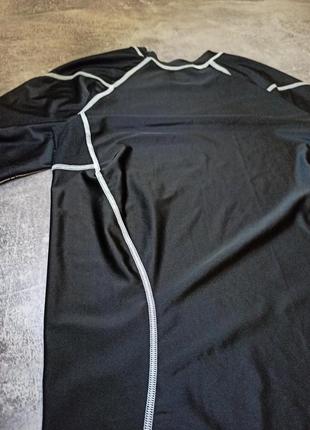 Мужская спортивная эластичная футболка для тренировок из легкого дышащего материала. с анатомическим кроем.4 фото