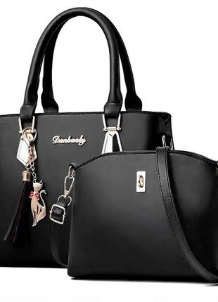 Комплект сумок два в одному: жіноча сумка та міні сумочка клатч.