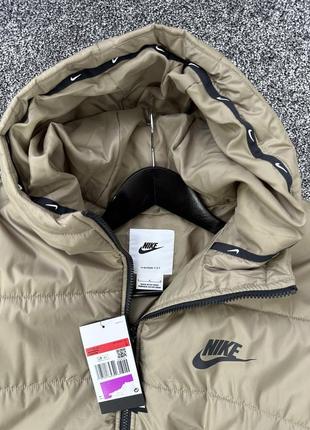 Женская куртка nike5 фото