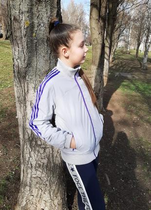 Двостороння жіноча вітровка adidas