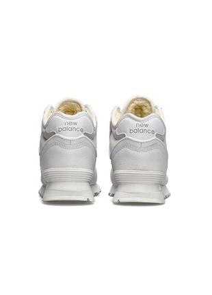 Зимові жіночі кросівки new balance 574 high all white fur7 фото