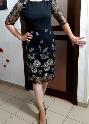 Красивое вечернее кружевное платье миди с вышивкой3 фото
