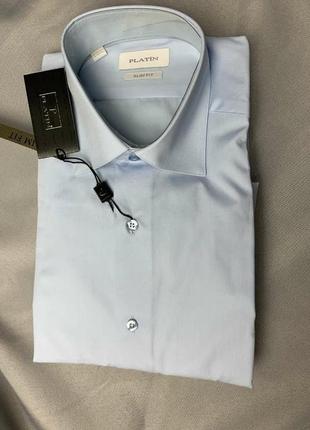 Рубашки мужские