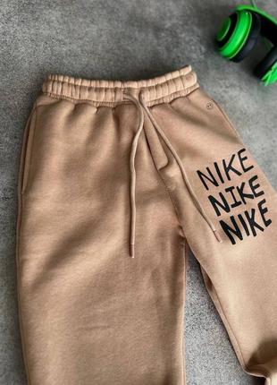Люксові спортивні штани на флісі  в стилі найк якісні чоловічі теплі зимові nike преміум7 фото
