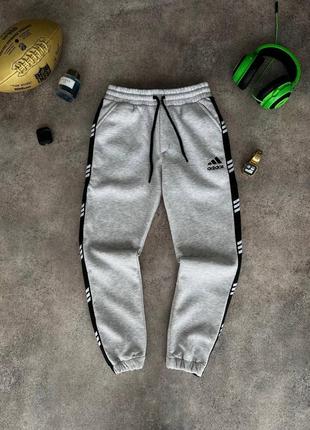 Очень теплые люксовые спортивные штаны в стиле адидас мужские зимние качественные adidas на флисе с вышивкой премиум6 фото