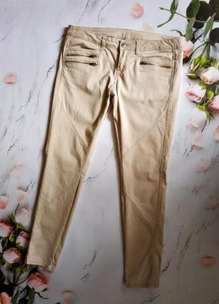 Стильные бежевые брюки,  джинсы1 фото