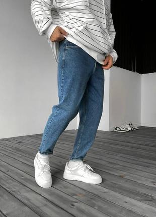 Топовые джинсы мом1 фото