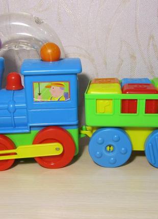 Розвиваюча іграшка  "паровозик з кульками та з вагоном" devik play.