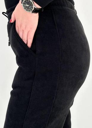 Чорні теплі вельветові брюки на флісі3 фото
