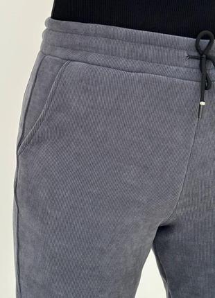 Чорні теплі вельветові брюки на флісі7 фото