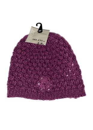 В’язана ажурна шапочка для дівчинки з квіткою