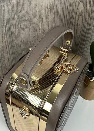 Жіноча міні сумочка рептилія каркасна із замочком, маленька сумка золотиста6 фото