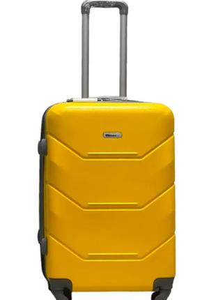 Дорожный чемодан для ручной клади на 4 колесиках madisson размер s желтый четырехколесный чемоданчик1 фото