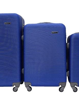 Велика дорожня пластикова валіза на 4 колесах розмір l milano синя валіза чотириколісна чемодан на колесах6 фото