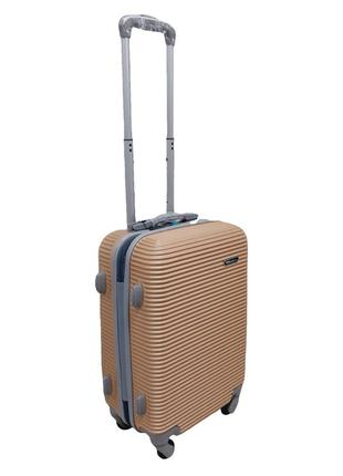 Пластиковый чемодан четырехколесный ручная кладь carbon размер s шампань дорожный небольшой чемоданчик3 фото