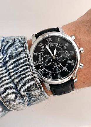 Сріблястий чоловічий наручний годинник з чорним циферблатом, на чорному ремінці2 фото
